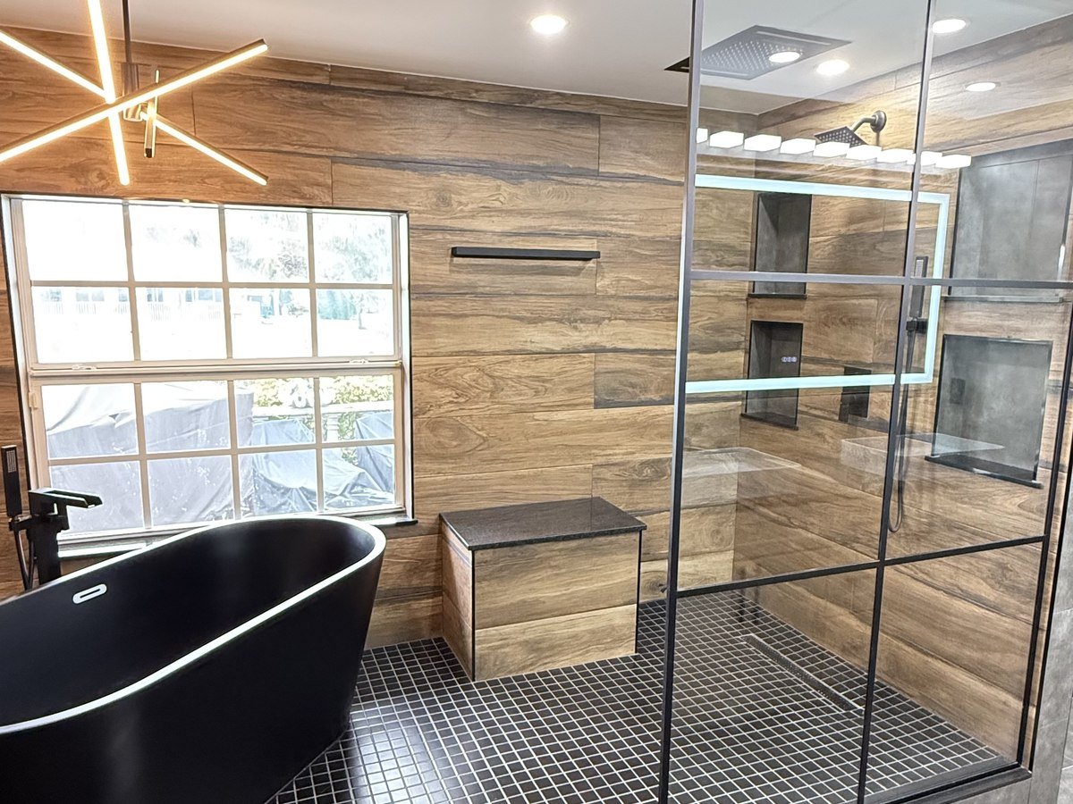 Industrial-modern bathroom with matte black fixtures, South Florida bathroom remodel